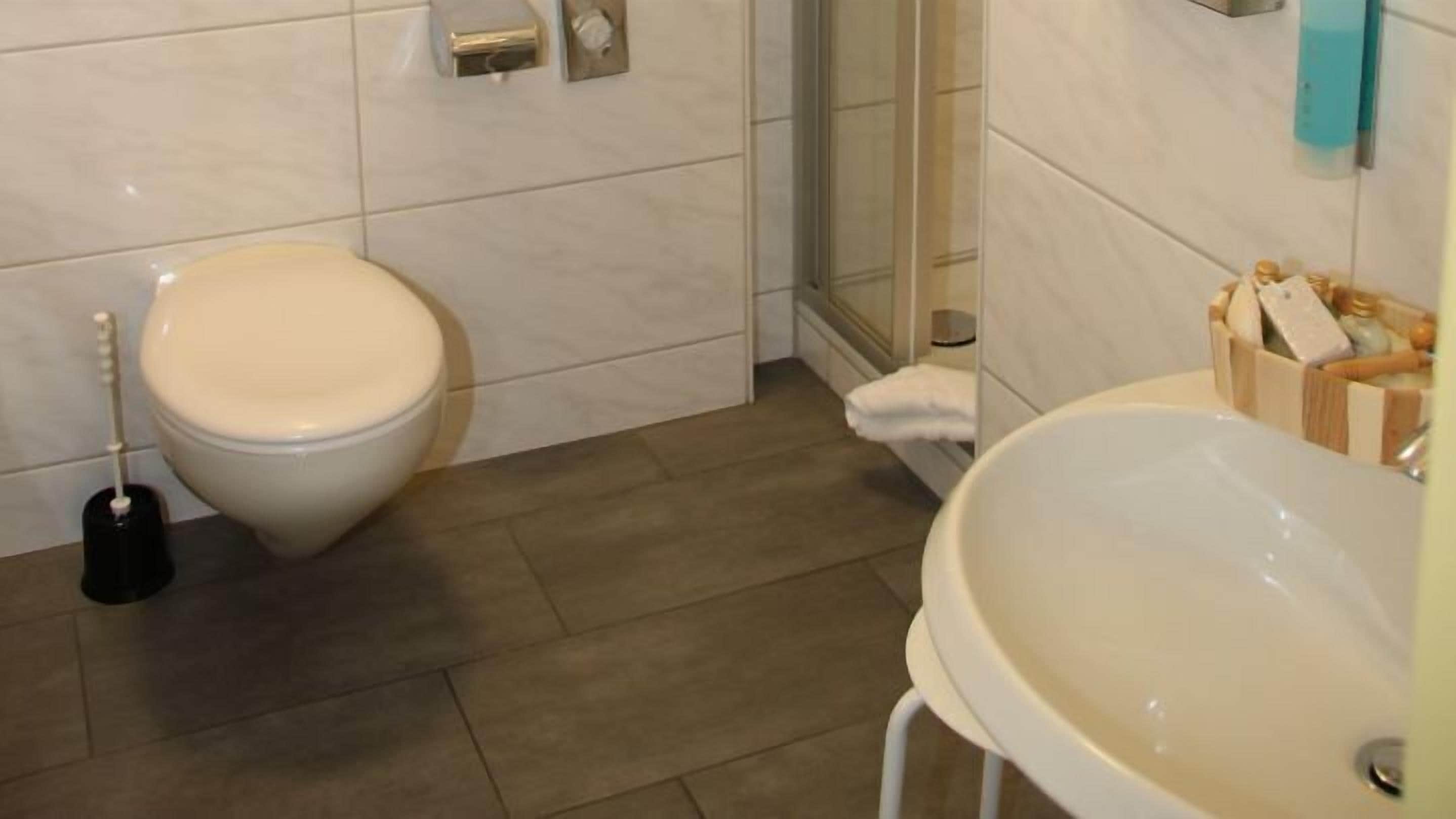 combined shower/bathtub, hair dryer, towels, soap