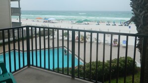A pool area with a view of the beach and ocean. - Beach Front Condo PCB! Spring/Fall and Winter Discount Rates Available Now!! (Panama City Beach)