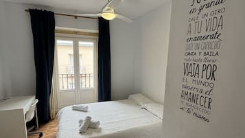 Triple Room, Private Bathroom | Iron/ironing board, free WiFi, bed sheets