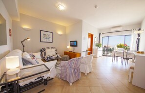 Apartment, 1 Bedroom, Terrace, Ocean View | Living area | Flat-screen TV - A08 - Magnólia Sea View Apartment by DreamAlgarve (Lagos)