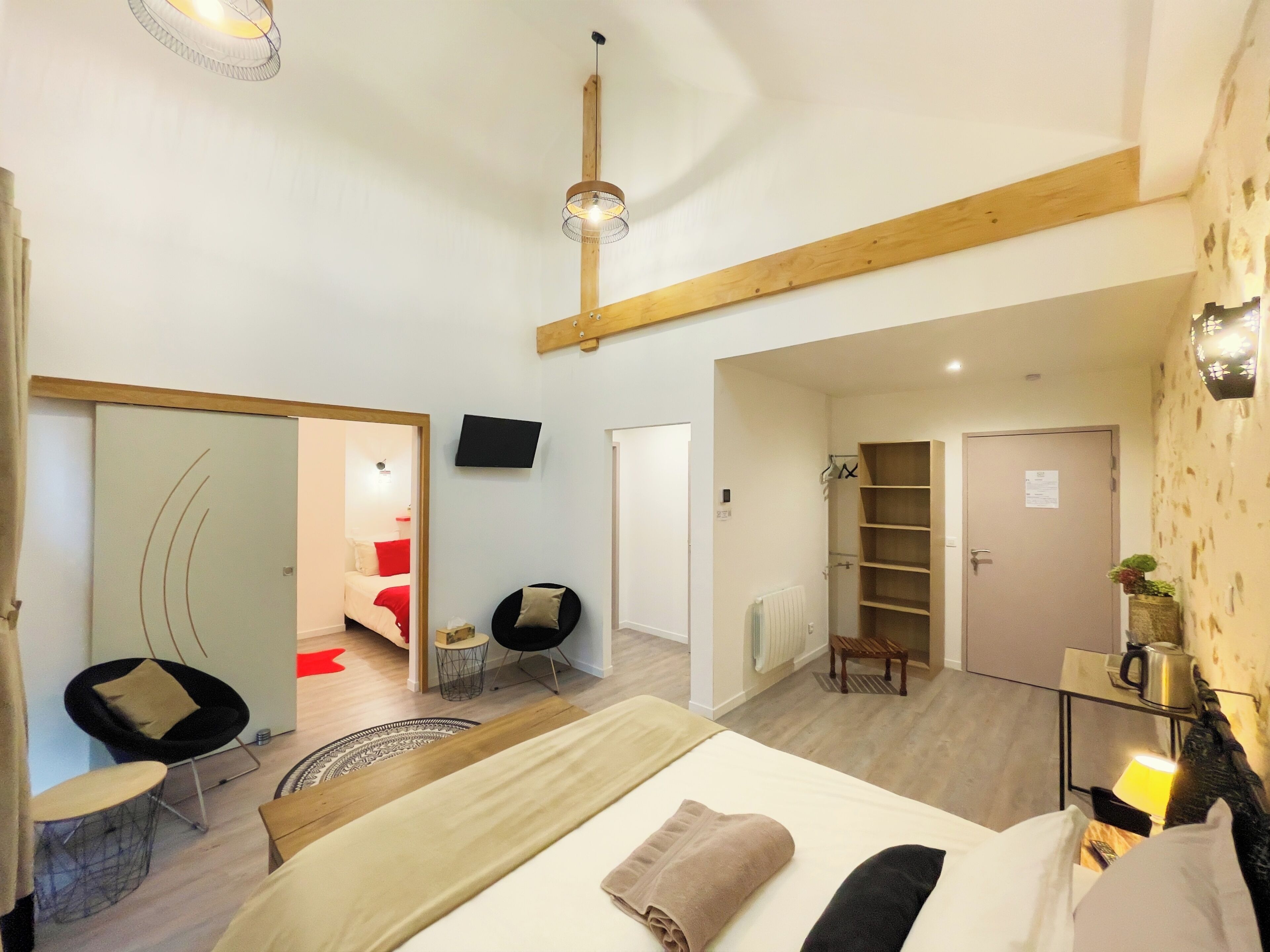 Superior Quadruple Room, Courtyard View | Living area | 80-cm flat-screen TV with digital channels, toys, books