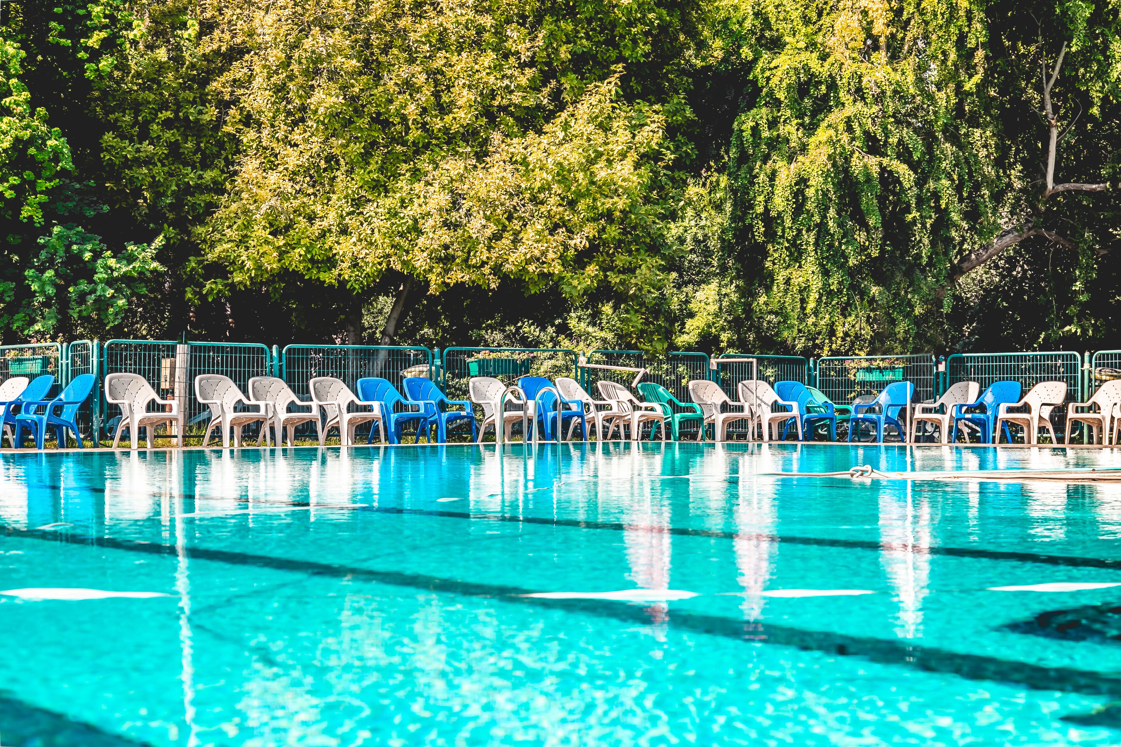 seasonal outdoor pool, open 10:00 am to 7:00 pm, pool umbrellas