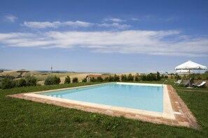 Seasonal outdoor pool, pool umbrellas, sun loungers