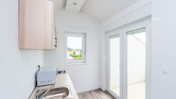 Luxury Studio, Balcony | Private kitchenette | Fridge, electric kettle