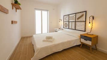 1 chambre, fer et planche à repasser, lits bébé (en supplément)