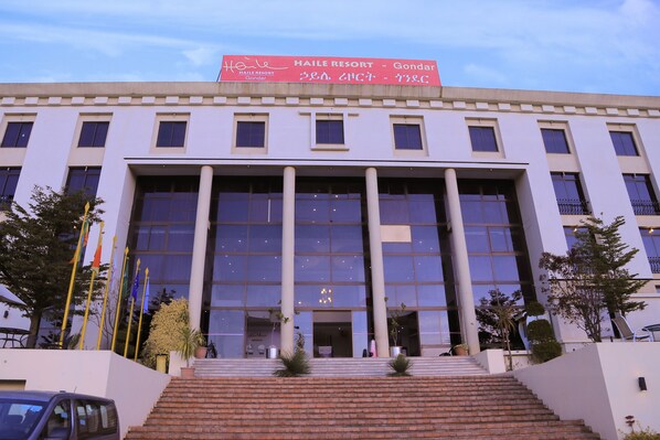 A large building with a prominent sign for Haile Resort - Gondar. - Haile Resort Gondar (Gondar)