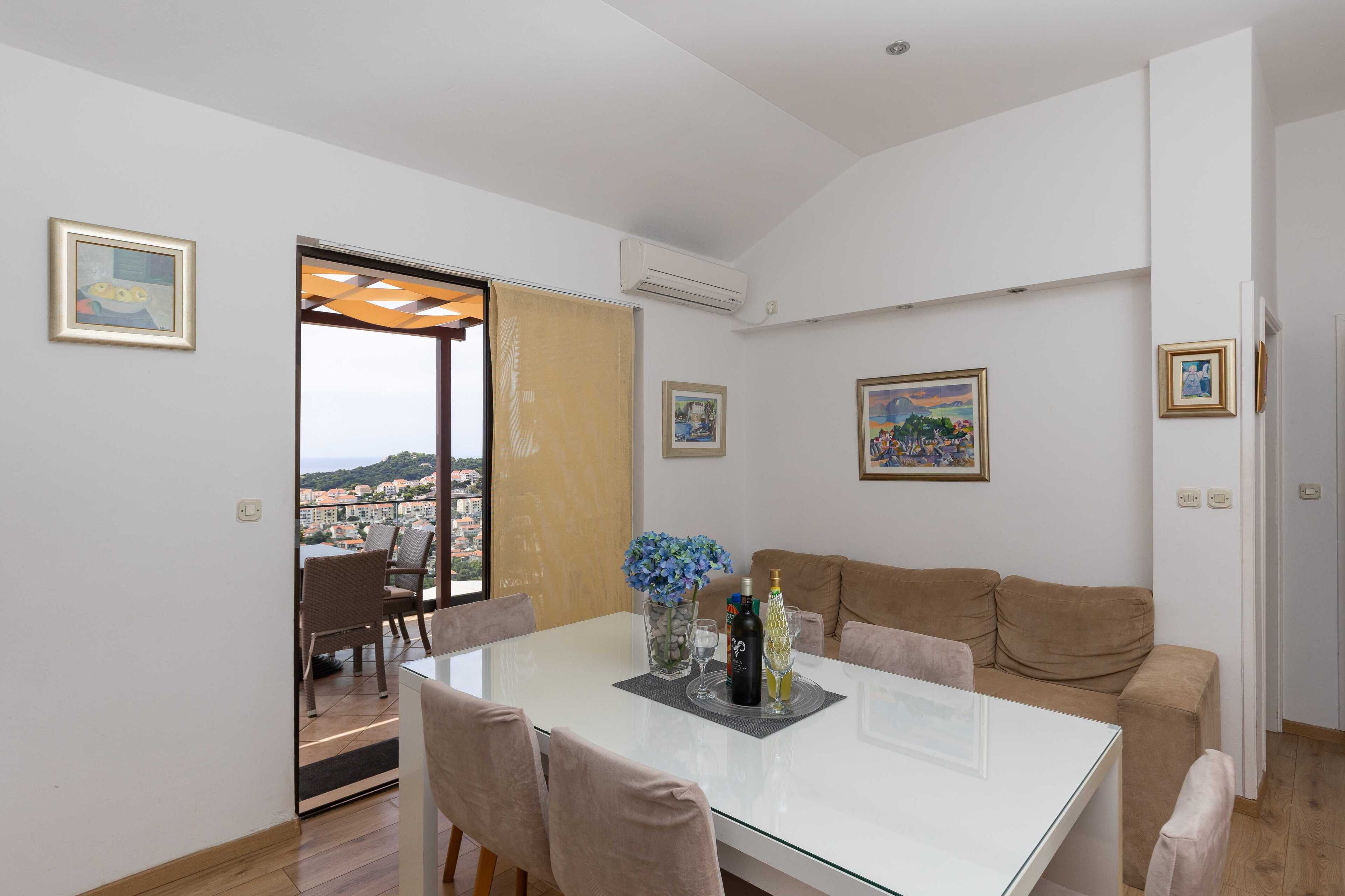 Apartment, 2 Bedrooms, Balcony, Sea View | Living area | Flat-screen TV