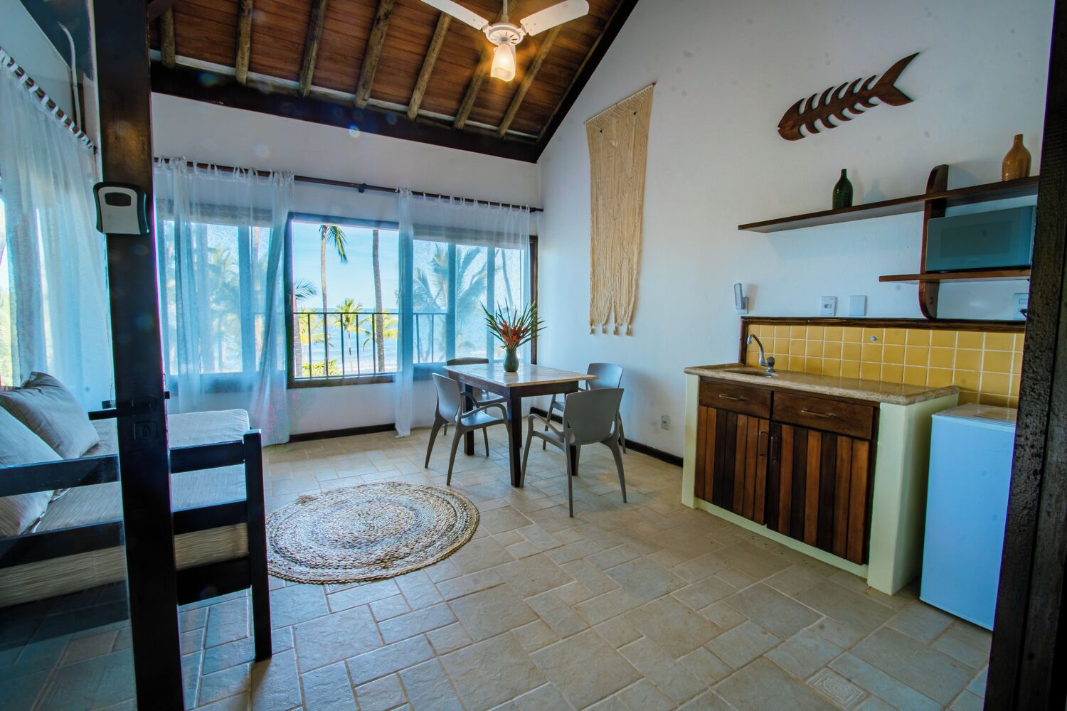 Casa, 1 habitación, vistas a la playa (Studio) | Zona de estar | Una televisión de pantalla plana