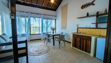 Casa, 1 habitación, vistas a la playa (Studio) | Zona de estar | Una televisión de pantalla plana