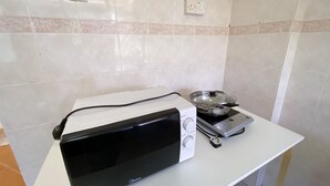 Family Apartment, Pool View | Private kitchen - Vitatree Cottage (Langkawi)