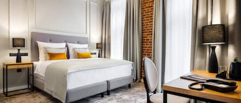 Chambre Confort Double ou avec lits jumeaux | Literie hypoallergénique, minibar, coffres-forts dans les chambres