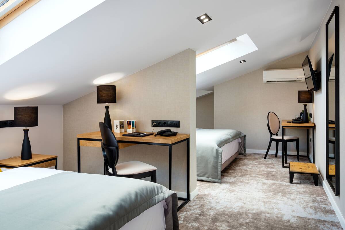 Family Studio | Hypo-allergenic bedding available, minibar, in-room safe, desk