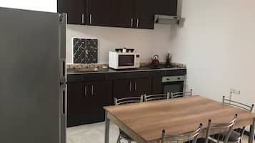 Apartment, 2 Bedrooms (Marilyn Monroe) | Private kitchen | Full-sized fridge, microwave, oven, stovetop