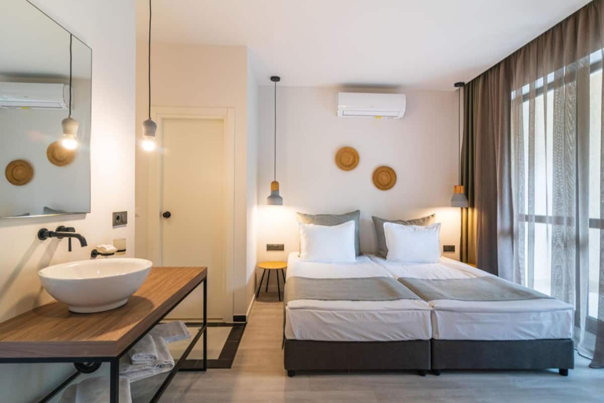 Standard Double or Twin Room | Minibar, desk, laptop workspace, blackout drapes