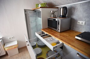 Apartment (for 3 Person) | Private kitchen | Full-size fridge, microwave, oven, stovetop