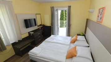 Kamar Double atau Twin | 1 kamar tidur, minibar, brankas, dan tirai kedap cahaya