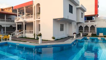 Outdoor pool, pool umbrellas, pool loungers
