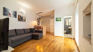 Double Room, Balcony | Living area | Smart TV