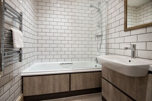 Eco-friendly toiletries, hair dryer, towels