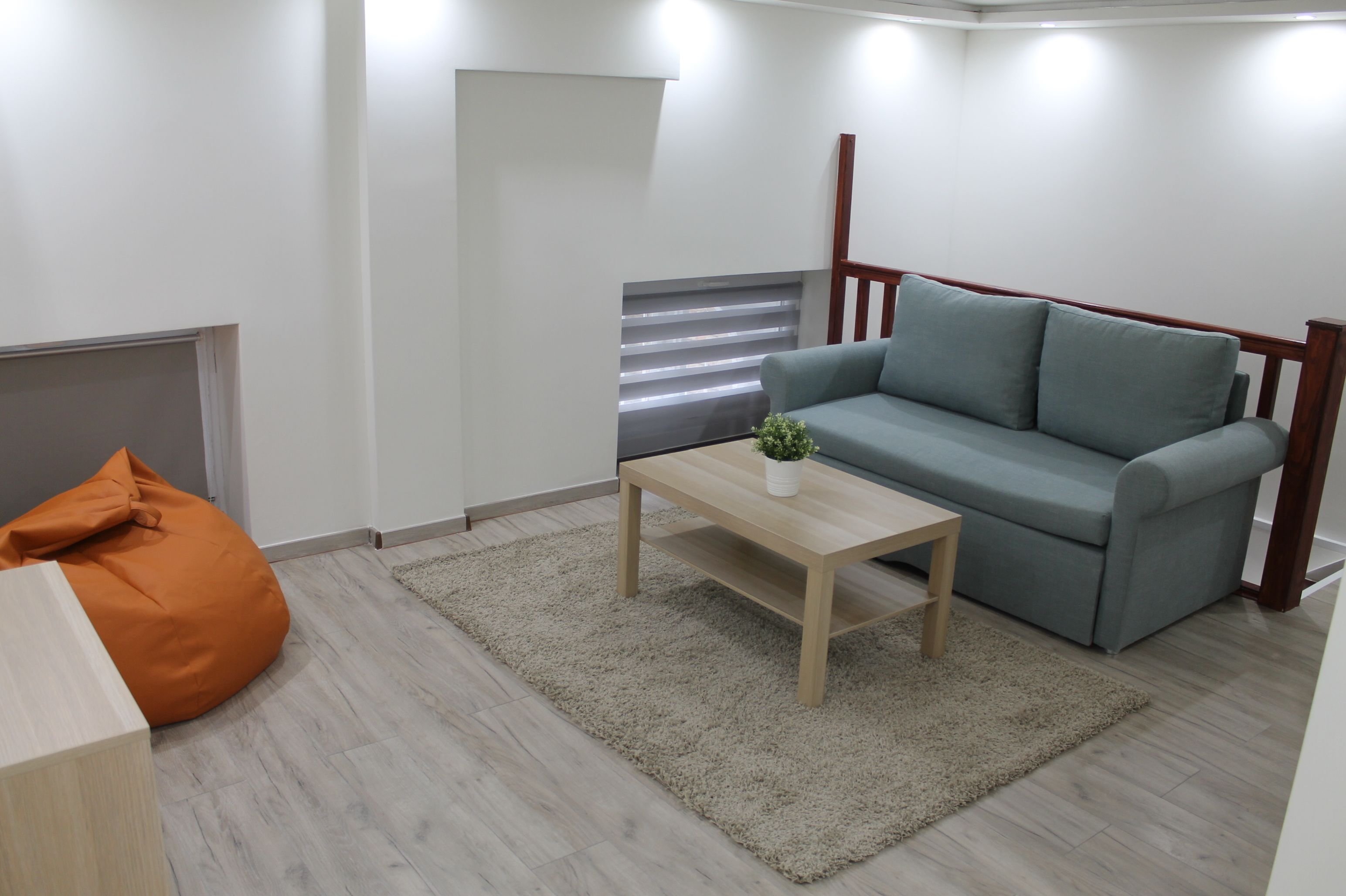 Deluxe Apartment | Living area | Flat-screen TV