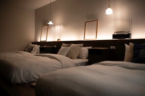 Senior Quadruple Room | Individually decorated, individually furnished, desk, blackout drapes - How Chill Inn (Tainan)