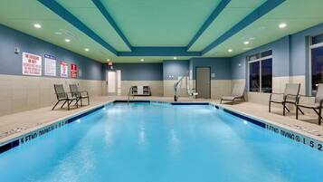 Indoor pool, open 9:00 AM to 11:00 PM, pool loungers