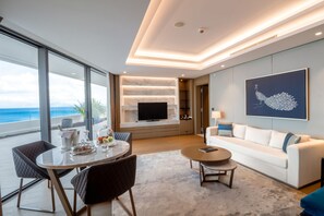 Grand Suite, 2 Bedrooms, Balcony, Sea View (Grand Reges Suite) | Living area | 55-inch Smart TV with satellite channels, TV - Reges, a Luxury Collection Resort & Spa, Cesme (Cesme)