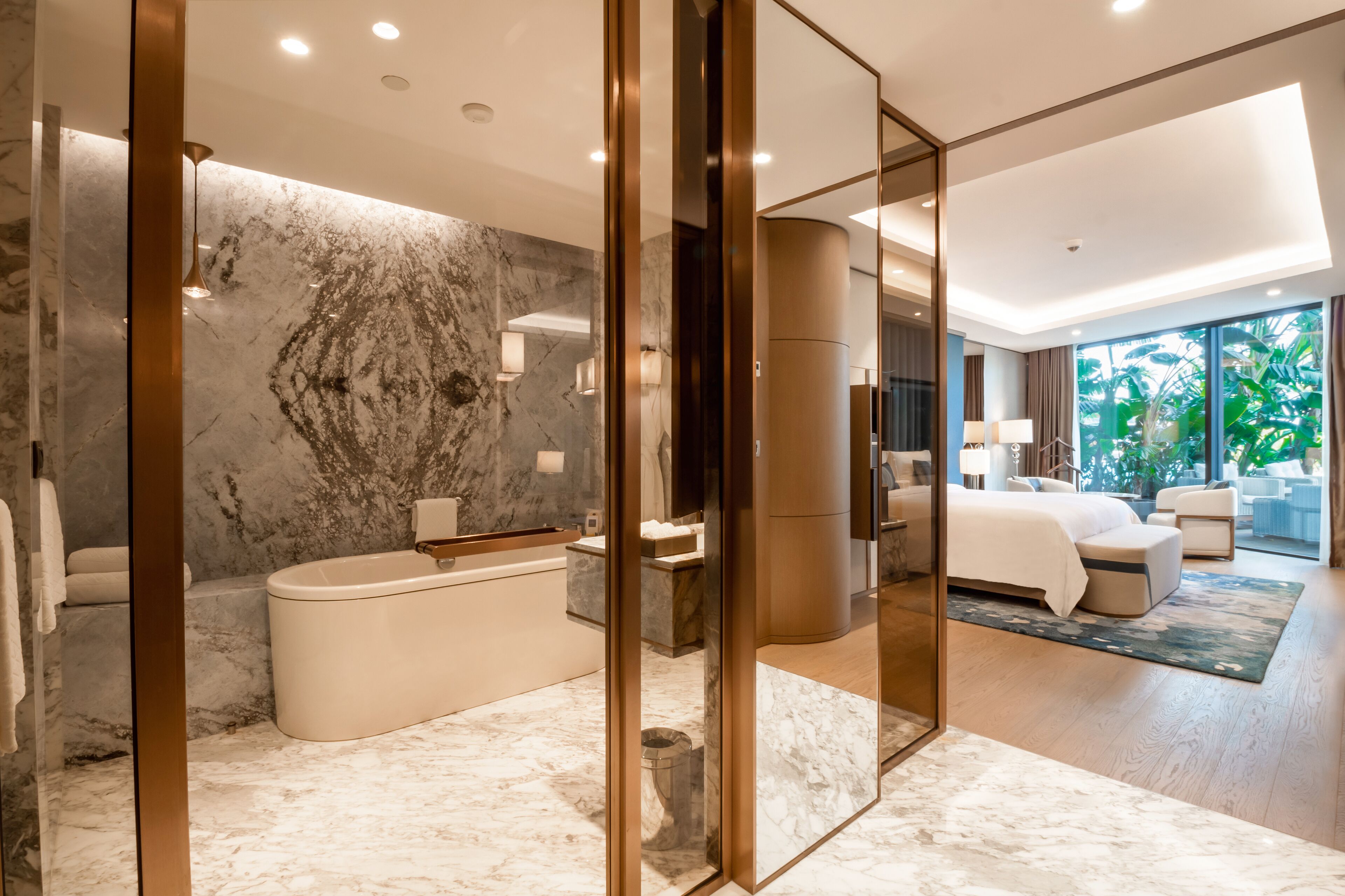 suite, 1 bedroom, pool view | bathroom | separate bathtub and shower, deep-soaking bathtub, rainfall showerhead