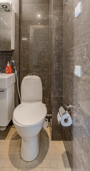 Apartment 9A 16 | Bathroom | Shower, hair dryer, towels, soap
