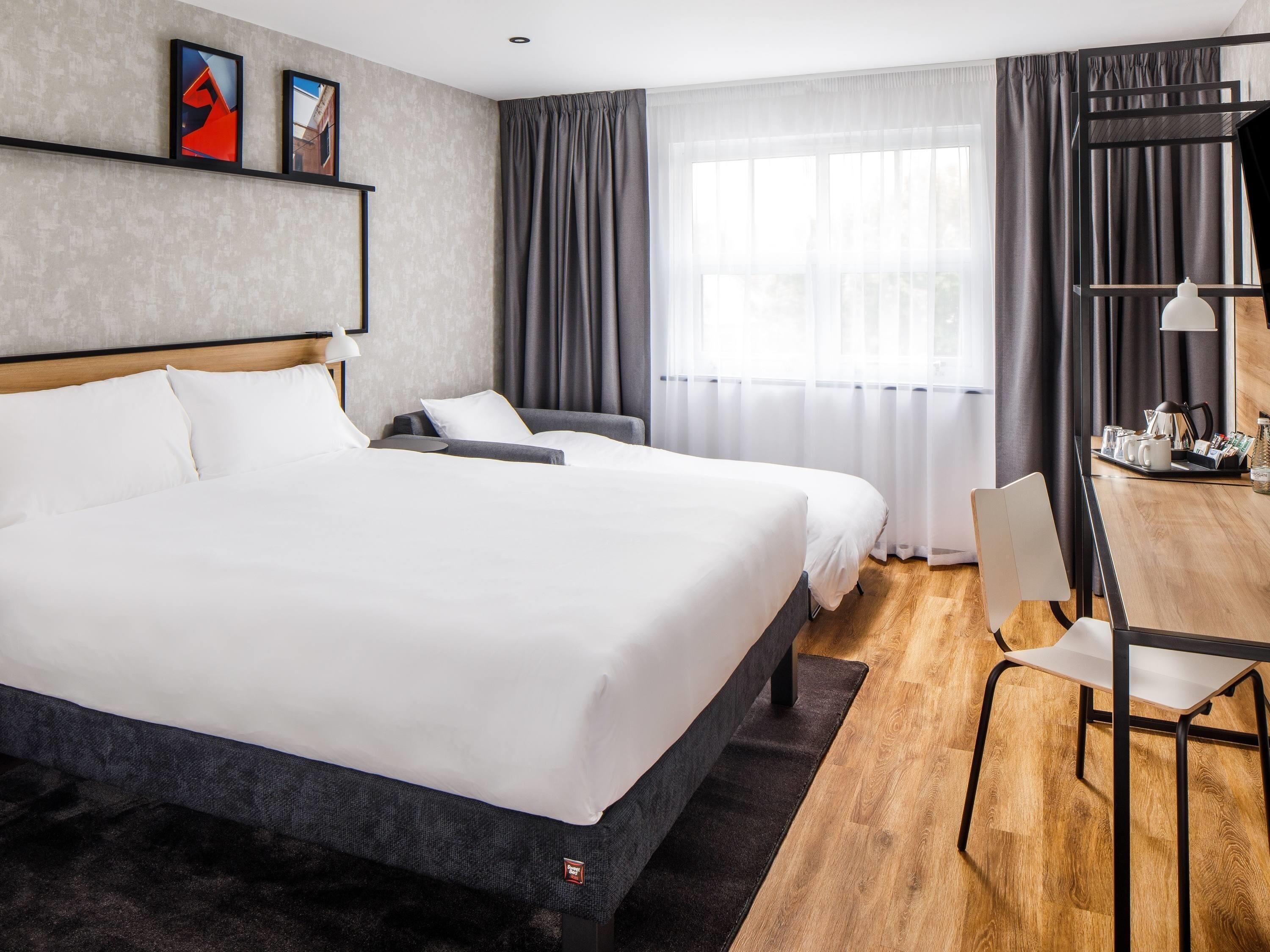 Desk, blackout curtains, free WiFi, bed sheets