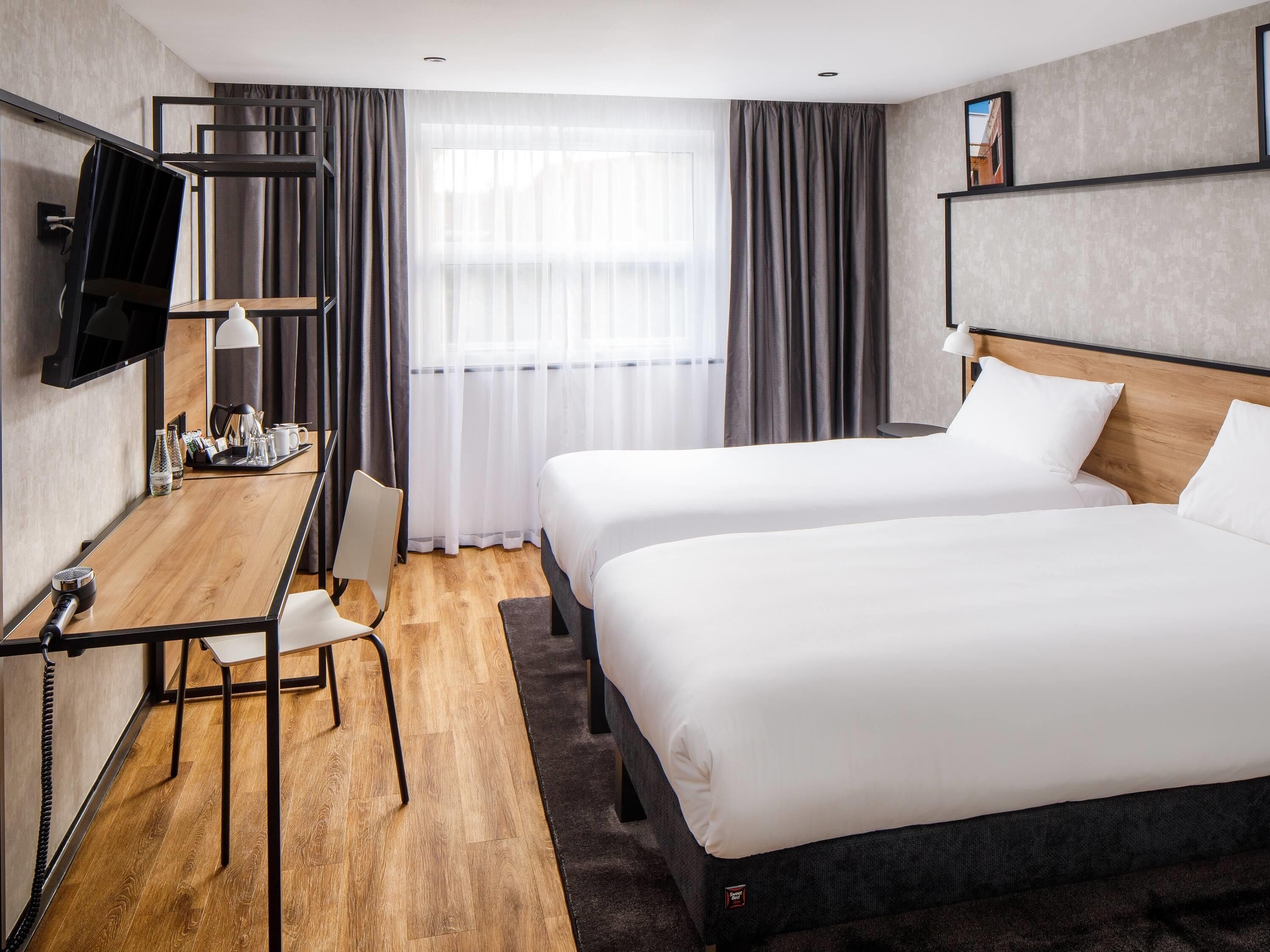 Desk, blackout curtains, free WiFi, bed sheets