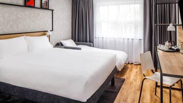 Desk, blackout drapes, free WiFi, bed sheets