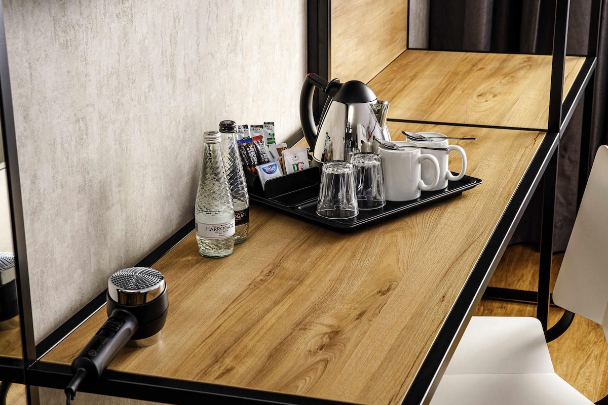 Desk, blackout curtains, free WiFi, bed sheets