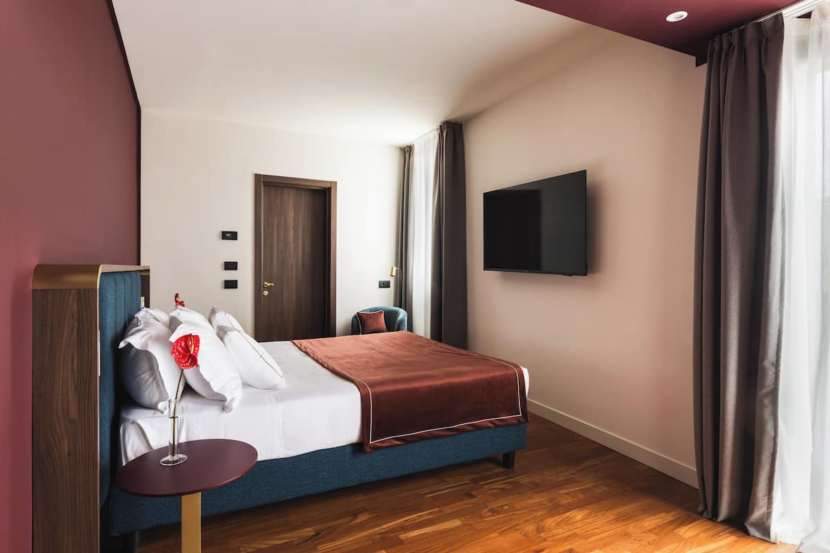Standaard kamer | 1 slaapkamer, een minibar, een kluis op de kamer, een bureau