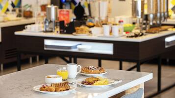 Daily buffet breakfast (EUR 18 per person)