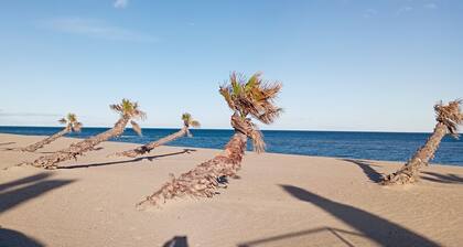 Ground floor garden apartment with sea view and pools