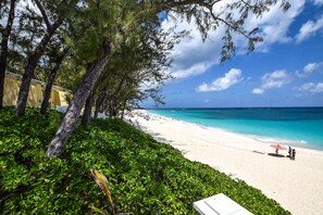 On the beach, sun loungers, beach towels