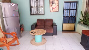 Habitación familiar, varias camas | Zona de estar