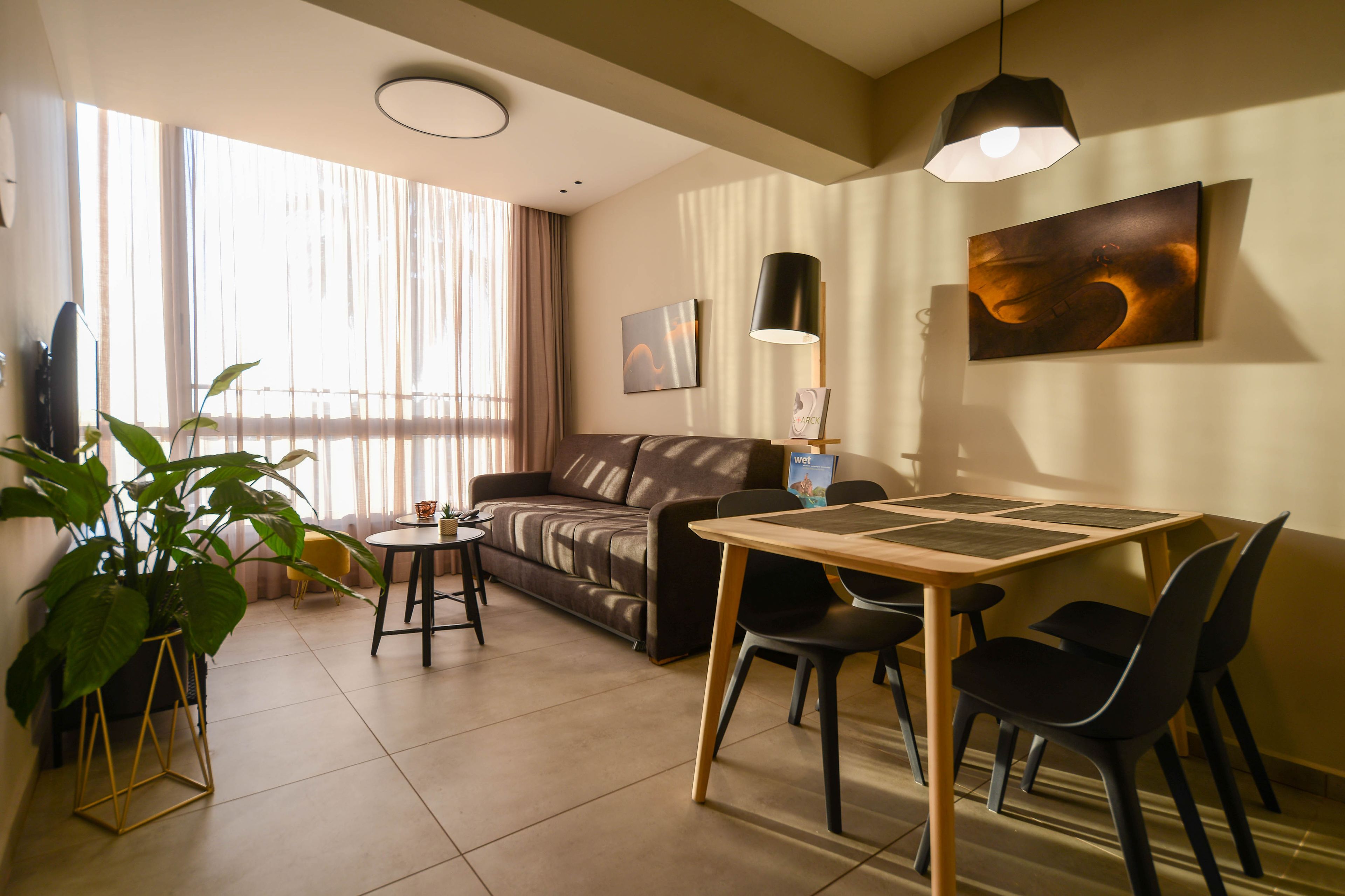 Luxury Apartment, Sea View | Living area | 65-inch Smart TV with premium channels, TV, Netflix