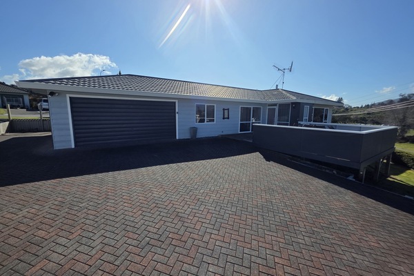 View showing garage and deck re