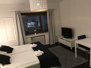 Apartamento | Ferros/tábuas de passar roupa, berços grátis, Wi-Fi de cortesia