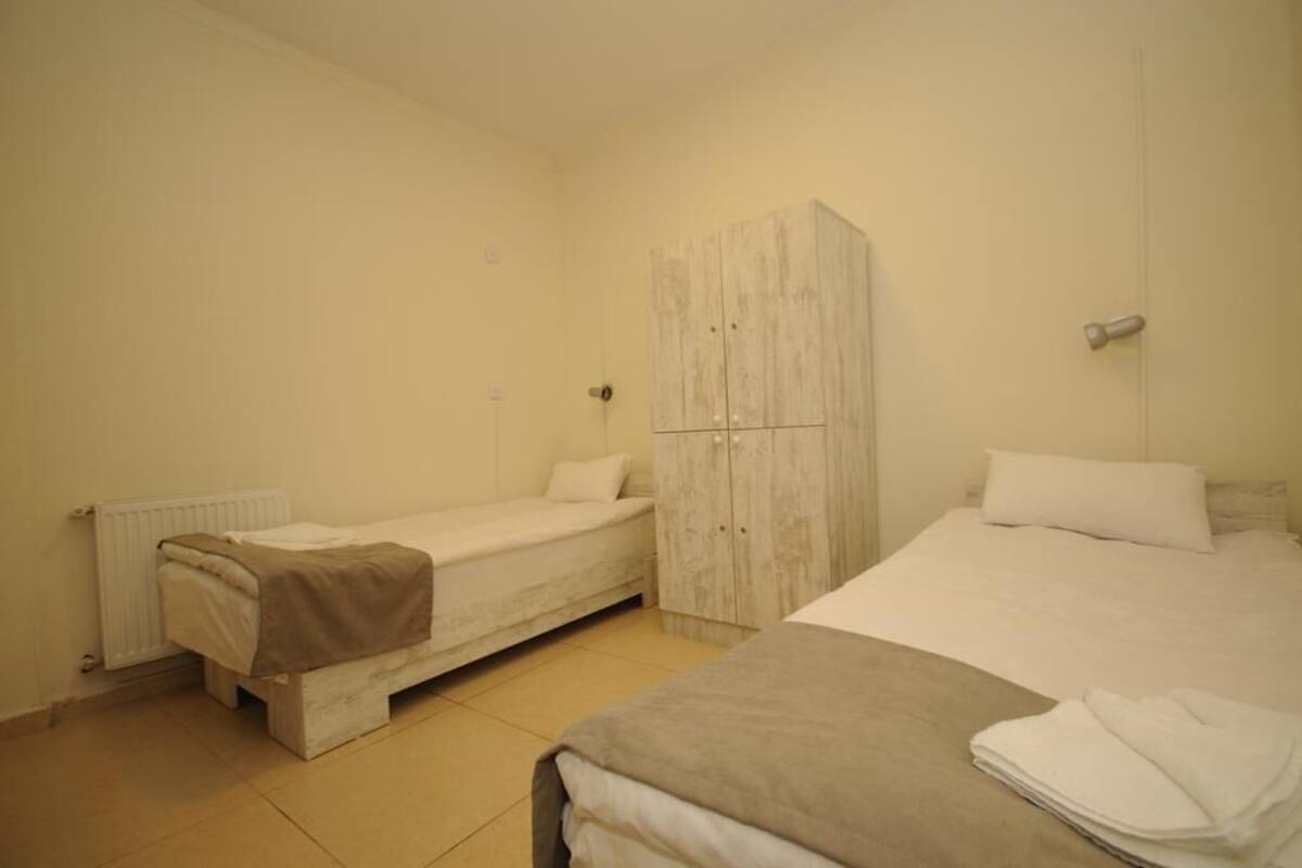 Economy Twin Room | Soundproofing, iron/ironing board (on request), WiFi (free), bed sheets