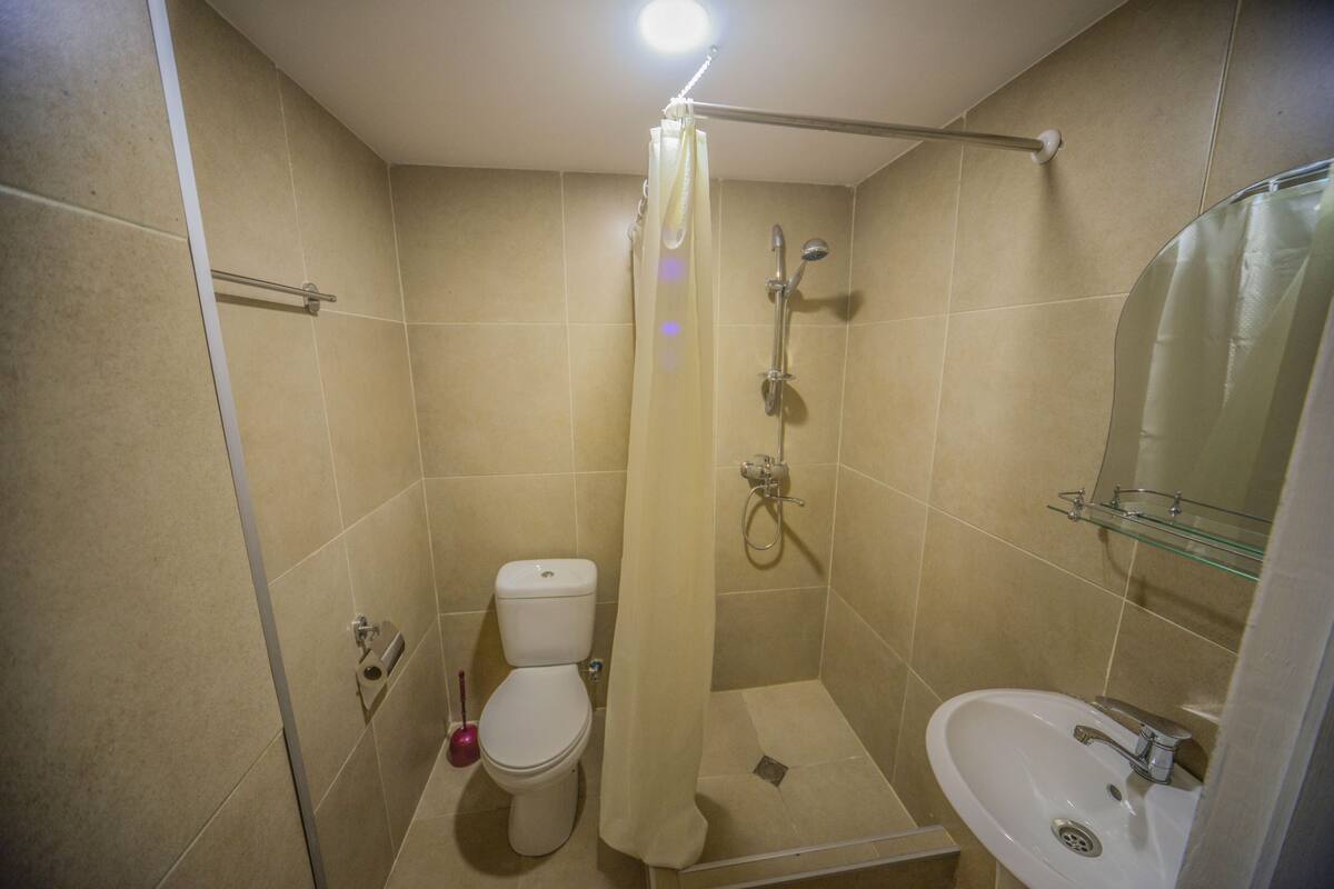 Economy Twin Room, Shared Bathroom | Bathroom | Shower, free toiletries, hair dryer, slippers