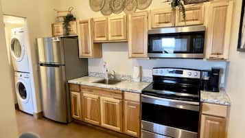 Premier Cabin | Private kitchen | Microwave, coffee/tea maker, freezer, dining tables