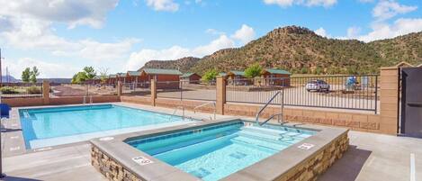 Seasonal outdoor pool, open 9:00 AM to 10:00 PM, sun loungers