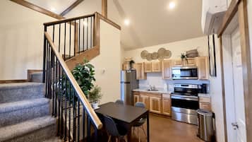 Premier Cabin | Private kitchen | Microwave, coffee/tea maker, freezer, dining tables