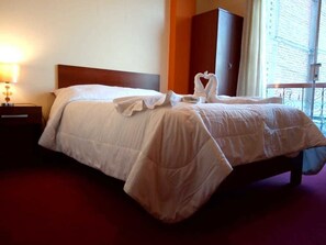 Laptop workspace, free WiFi, bed sheets