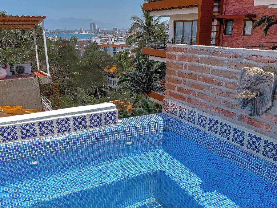Outdoor pool, open 10:00 AM to 10:00 PM, pool loungers
