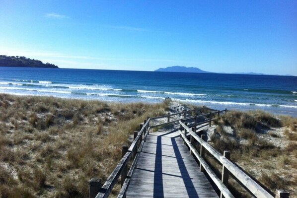 Espreguiçadeiras, toalhas de praia