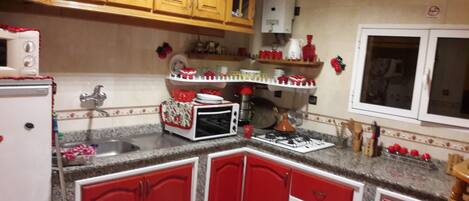 Microwave, coffee/tea maker, cookware/dishes/utensils